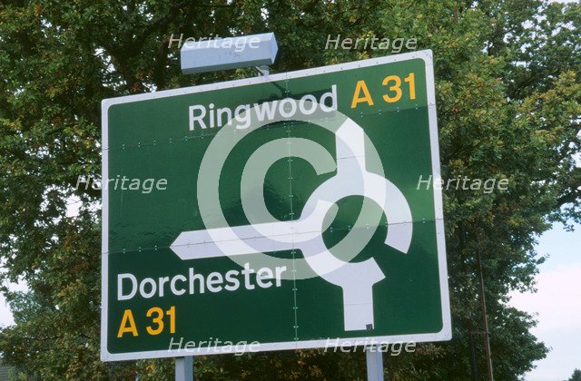 Road sign. A road. Artist: Unknown.