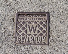 A water stop tap cover plate made by Rye and Blackwell, Swindon, Wiltshire, 2006. Artist: Peter Williams.