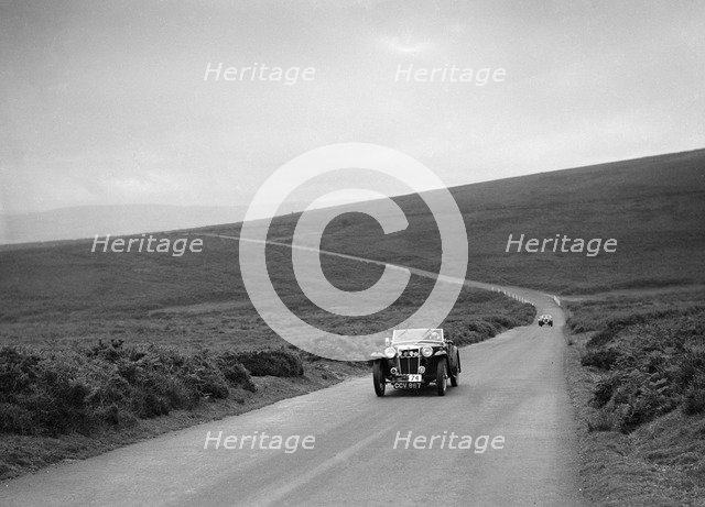 MG TA of JW Appleby, winner of a premier award at the MCC Torquay Rally, July 1937. Artist: Bill Brunell.