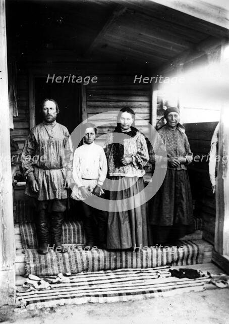 A peasant family from the village of Lovatskaya, Kansky district, 1905. Creator: Unknown.