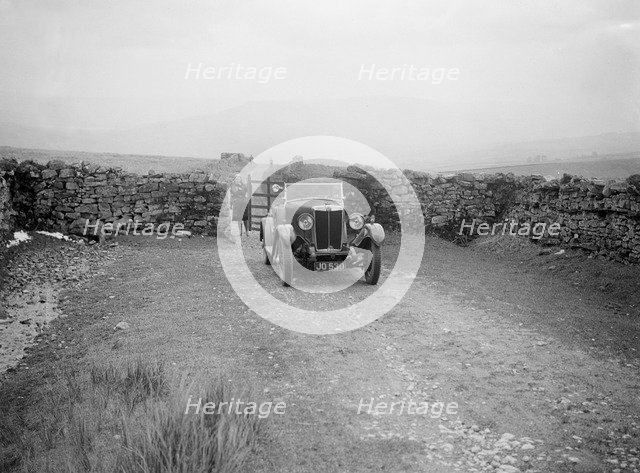 Kitty Brunell road testing a MG 18/80, April 1931. Artist: Bill Brunell.