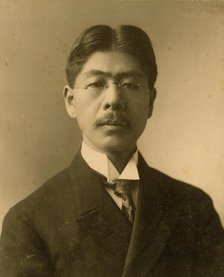 Tokutaro Sakai, head-and-shoulders portrait, facing front, c1904. Creator: J E Purdy.