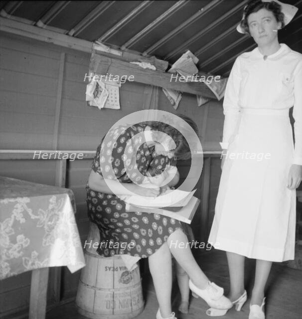 Resident nurse, FSA camp, Farmersville, CA, 1939. Creator: Dorothea Lange.