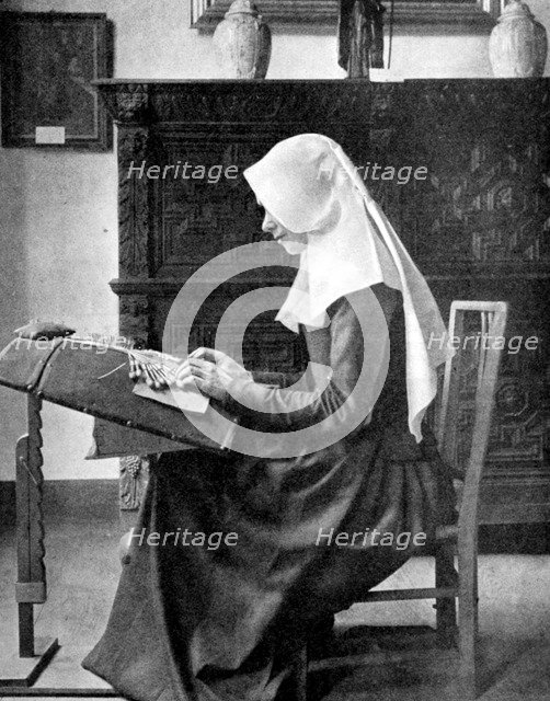 Nun making lace, Bruges, Belgium, 1936. Artist: Donald McLeish