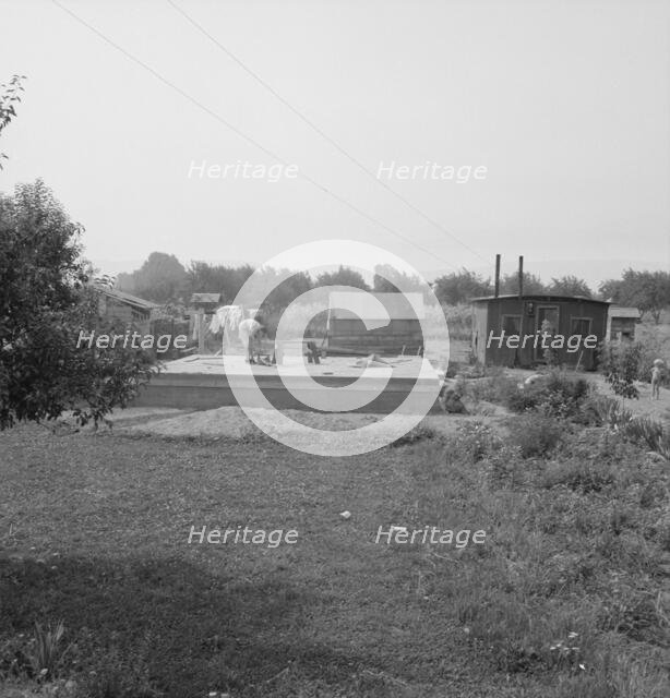 Possibly: Close-up of present dwelling from which family will move..., near Yakima, Washington, 1939 Creator: Dorothea Lange.