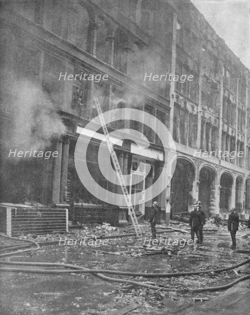 'Firemen Tackle City Blaze', 1940, (1940). Artist: Unknown.