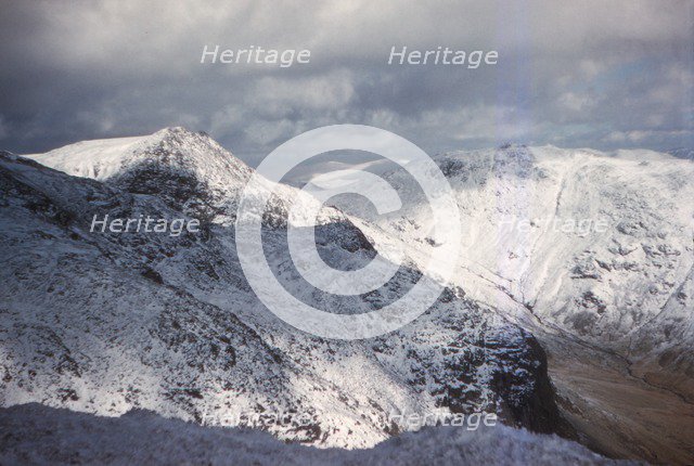 Scafell and Scafell Pike in Winter, English Lake District, Cumbria, 20th century. Artist: CM Dixon.