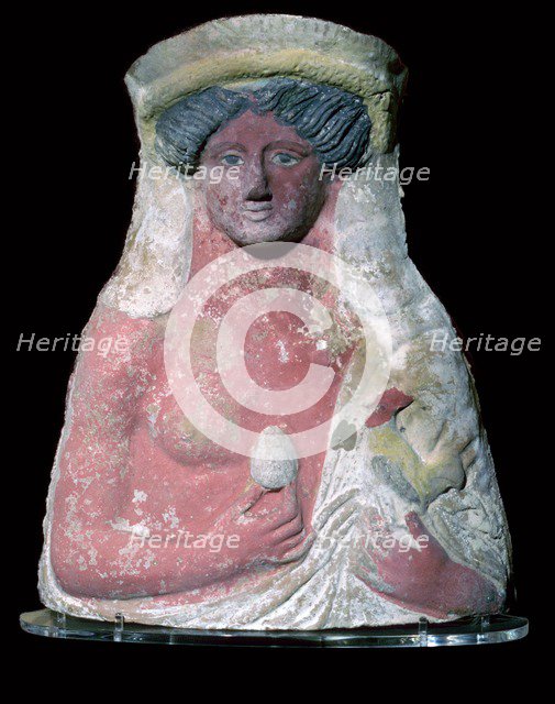 Terracotta bust of Dionysus with common offerings at tombs. Artist: Unknown