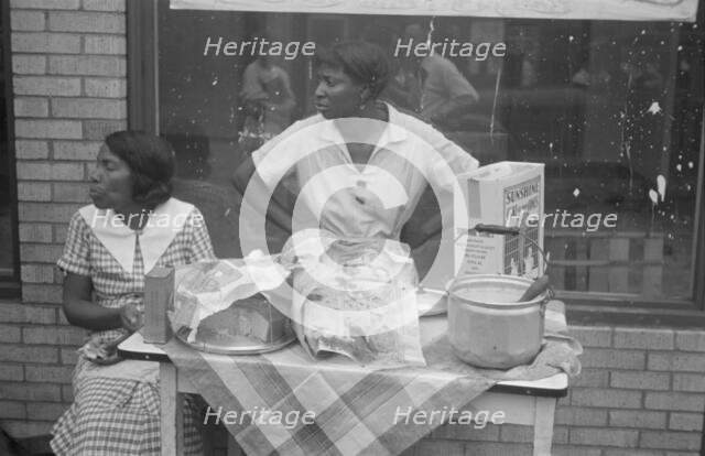 Women selling ice cream and cake, Scotts Run, West Virginia, 1935. Creator: Walker Evans.