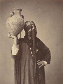Porteuse d'eau au Caire [Water Carrier in Cairo], c. 1870. Creator: Felix Bonfils.
