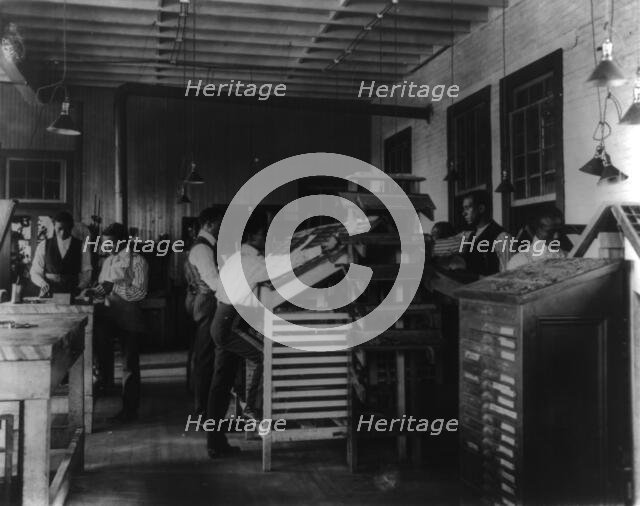 Students working in print shop, Tuskegee Institute, Alabama, 1902. Creator: Frances Benjamin Johnston.