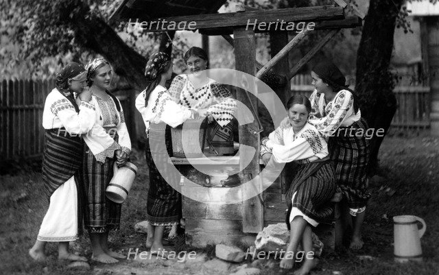 Young women in traditional dress, Bistrita Valley, Moldavia, north-east Romania, c1920-c1945. Artist: Adolph Chevalier