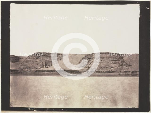 General View of Monuments Carved into Bedrock with Photographer's Dahabieh. Abu Simbel, 1851-1852. Creator: Félix Teynard (French, 1817-1892).