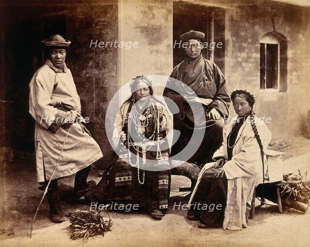 Darjeeling, India: women and men in traditional dress, 1904. Creator: Unknown.