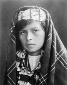 Quinault female head-and-shoulders portrait, facing slightly left, c1913. Creator: Edward Sheriff Curtis.