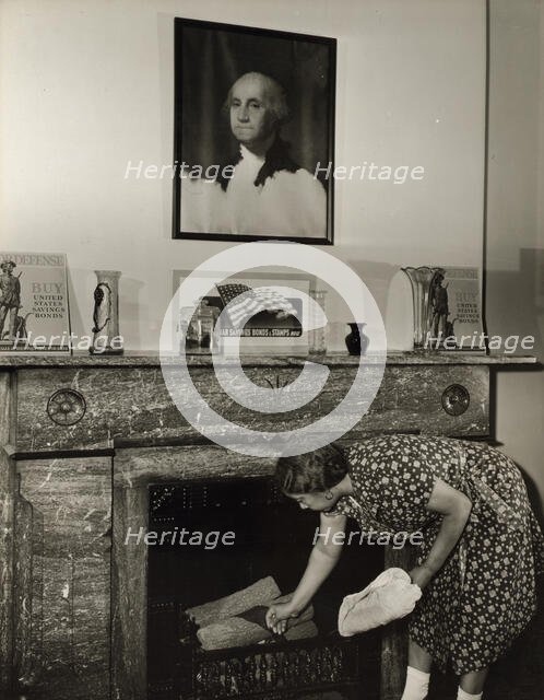 Government charwoman cleaning after regular working hours, Washington, D.C., 1942. Creator: Gordon Parks.