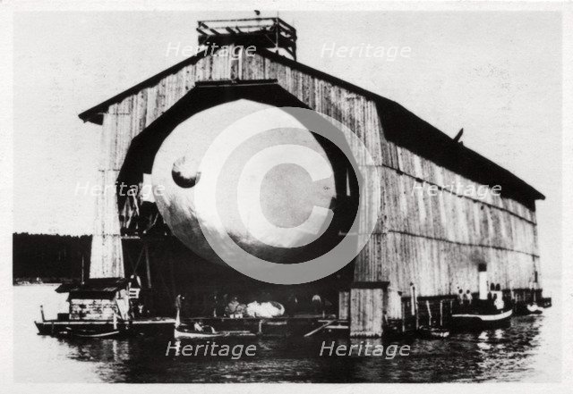 Zeppelin LZ1 in a floating hanger at Manzell, Friedrichshafen, Germany, 1900, (1933). Artist: Unknown