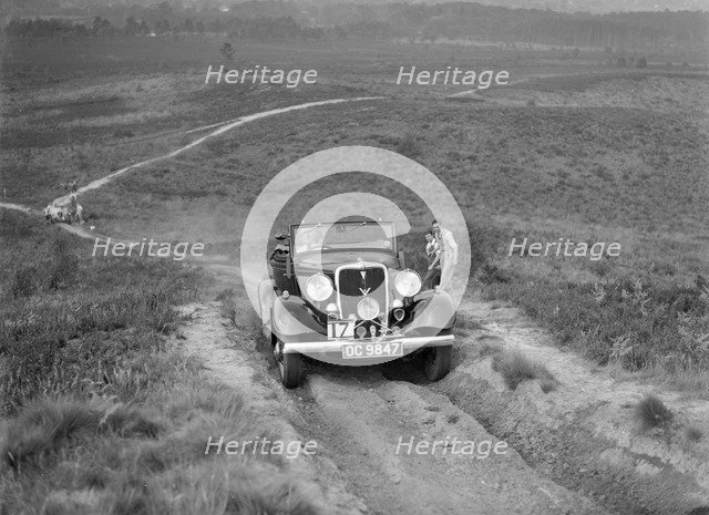 1934 Ford V8 open 2-seater taking part in the NWLMC Lawrence Cup Trial, 1937. Artist: Bill Brunell.