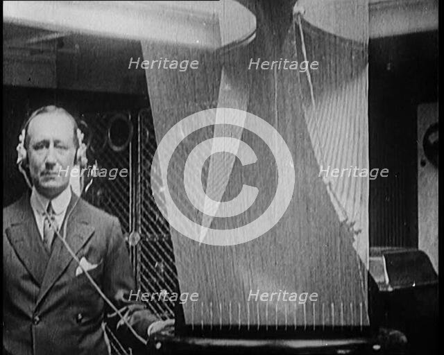 A Wireless Radio Aerial Spinning as Guglielmo Marconi Attempts to Receive a Signal, 1922. Creator: British Pathe Ltd.