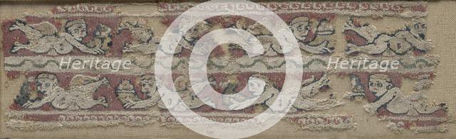 Fragment of a Sleeve Band with Floating Erotes, 600s - 700s. Creator: Unknown.