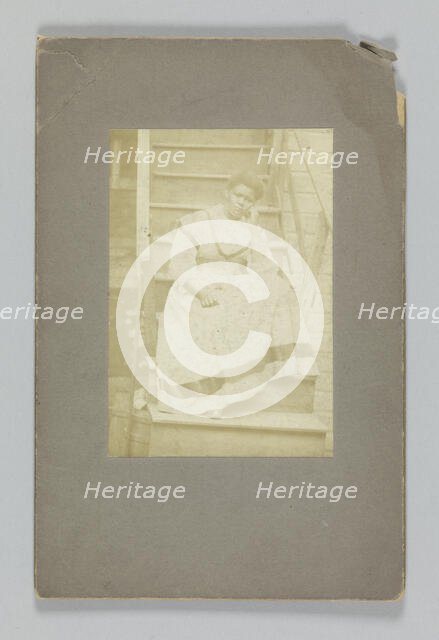 Albumen print of an unidentified woman sitting on stairs, 1850-1895. Creator: Unknown.