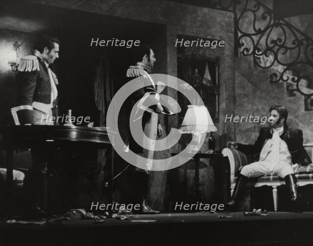 Two men standing, one sitting, 1938. Creator: Unknown.