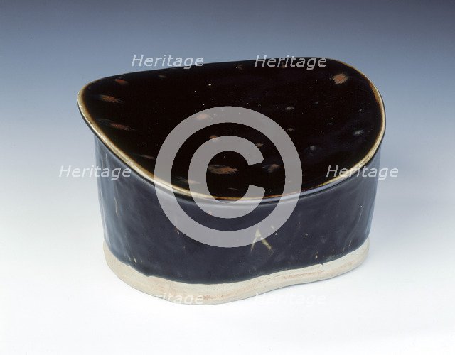 Ding black glazed pillow with hatched moulding, Jin dynasty, China, 12th century. Artist: Unknown
