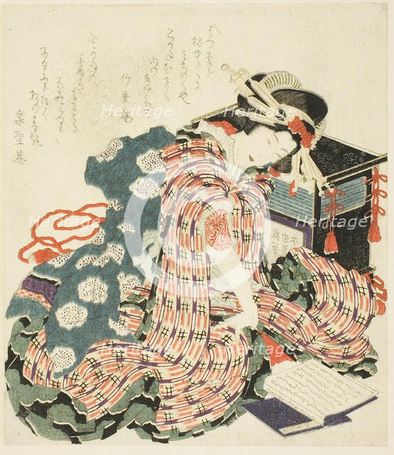 Young woman reading "The Pillow Book (makura no soshi)", Japan, 1822. Creator: Hokusai.