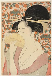 Woman Holding a Tortoise-shell Hair-comb, Japan, c. 1795/96. Creator: Kitagawa Utamaro.
