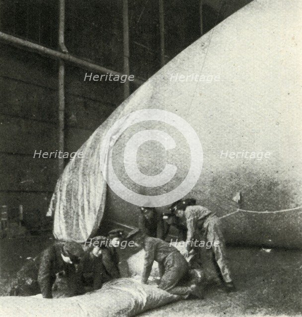 'Repairing Barrage Balloons', c1943. Creator: Cecil Beaton.
