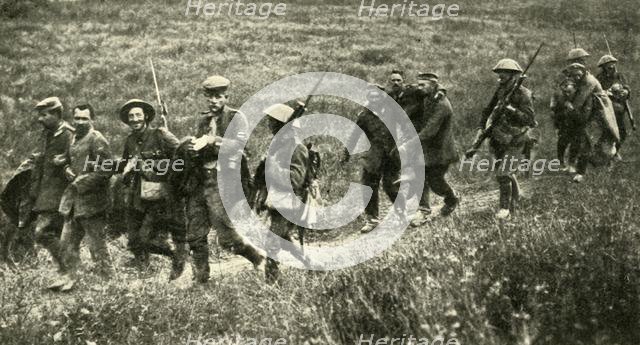 British soldiers with German prisoners of war, northern France, First World War, 1916, (c1920). Creator: Unknown.