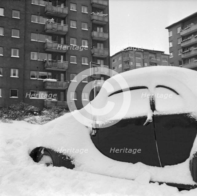 Car covered in snow, Stockholm, January 1954.
 Creator: Unknown.