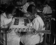Young Female Civilians Learning Embroidery in an Arts Class, 1920. Creator: British Pathe Ltd.