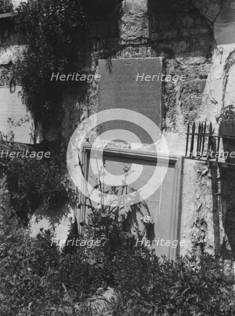 Wall tombs of the old St. Louis Cemetery, New Orleans, between 1920 and 1926. Creator: Arnold Genthe.