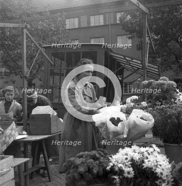 Flower stall in the market, Malmö, Sweden, 1947. Artist: Otto Ohm