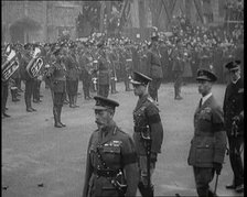 King George V, Edward, Prince of Wales, and Prince Albert Walking in Procession During..., 1920. Creator: British Pathe Ltd.