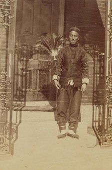 Thune Chin Sin, a Chinese house servant and errand boy, holding feather duster..., 1899. Creator: Eleanor Lord Pray.