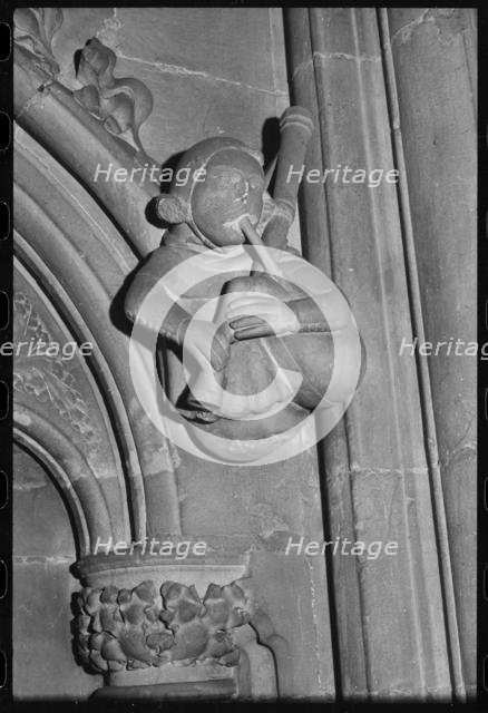 Carved figure, Minster Church of St John, Beverley, East Riding of Yorkshire, c1955-c1980. Creator: Ursula Clark.