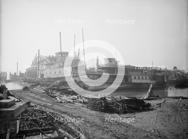 Old boats beached to rot away, New York City, between 1900 and 1910. Creator: Unknown.