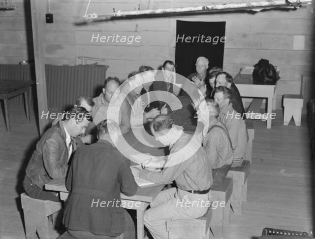 Meeting of the camp council, FSA camp, Farmersville, California, 1939. Creator: Dorothea Lange.