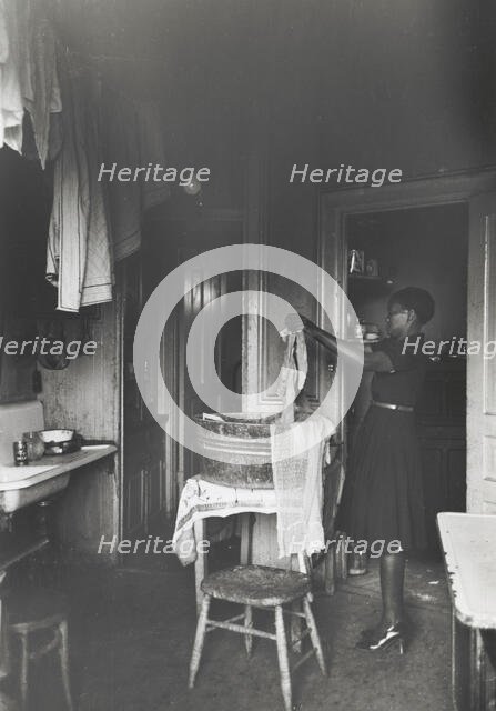 Kitchen of apartment occupied by Negroes, South Side of Chicago, Illinois, April 1941. Creators: Farm Security Administration, Russell Lee.