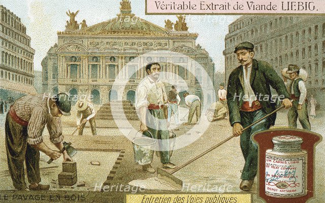 Surfacing a Paris street with wooden blocks, c1900. Artist: Unknown