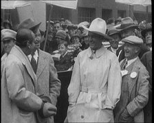 Silent Movie Stars Douglas Fairbanks, Will Rogers, and Tom Mix Posing for the Camera With..., 1921. Creator: British Pathe Ltd.