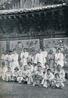 Priests and monks in a Korean monastery, or lamasery, 1902. Artist: Walter Hillier.