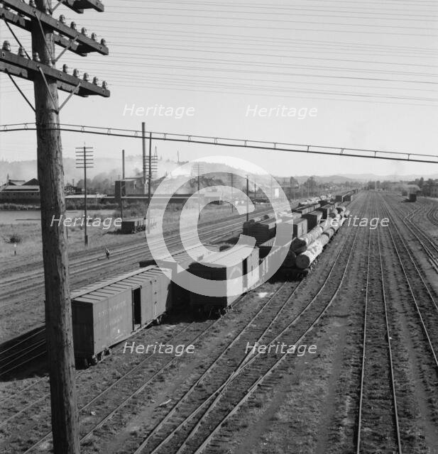 Railroad yard, looking down from highway bridge, Centralia, Lewis County, Washington, 1939. Creator: Dorothea Lange.