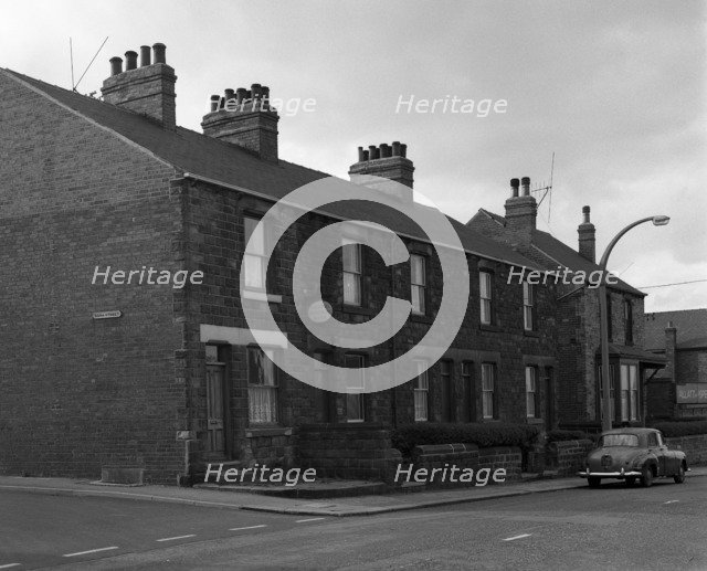 National Provincial Bank located in a terraced house, Goldthope, South Yorkshire, 1963.  Artist: Michael Walters