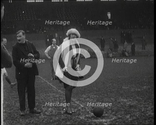 Alice Delysia Kicking Off a Men's Football Match, 1920. Creator: British Pathe Ltd.
