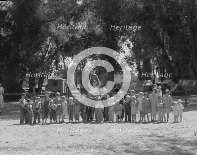Child welfare program, Resettlement Administration Marysville camp for migrants, California, 1935. Creator: Dorothea Lange.