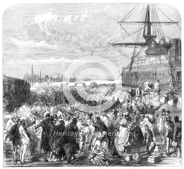 Embarkation of dockyard workmen as emigrants at Portsmouth, 1869. Creator: Unknown.
