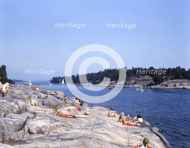 People on the rocks at Gryt Archipelago, Sweden, 1973. Artist: Torkel Lindeberg